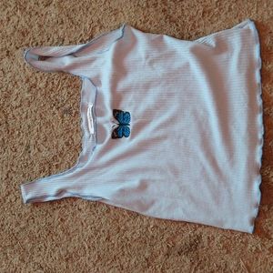 A cropped tank top with butterfly